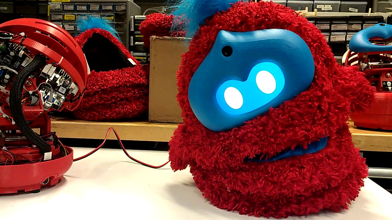 furry red and blue robot